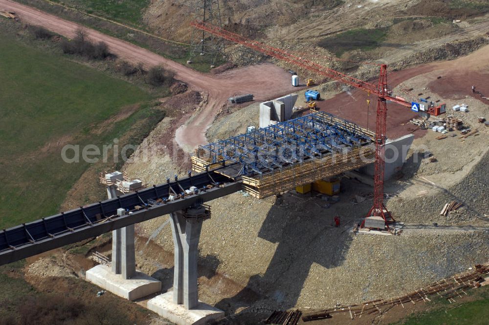 Aerial photograph Ettenhausen - Blick auf die Baustelle der neuen Nessetalbrücke mit einer Länge von 380 m. Die Brücke ist Teil des Projekt Nordverlegung / Umfahrung Hörselberge der Autobahn E40 / A4 in Thüringen bei Eisenach. Durchgeführt werden die im Zuge dieses Projektes notwendigen Arbeiten unter an derem von den Mitarbeitern der Niederlassung Weimar der EUROVIA Verkehrsbau Union sowie der Niederlassungen Abbruch und Erdbau, Betonstraßenbau, Ingenieurbau und TECO Schallschutz der EUROVIA Beton sowie der DEGE??