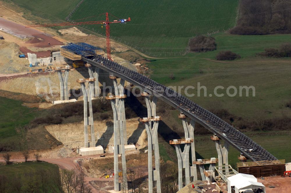 Aerial photograph Ettenhausen - Blick auf die Baustelle der neuen Nessetalbrücke mit einer Länge von 380 m. Die Brücke ist Teil des Projekt Nordverlegung / Umfahrung Hörselberge der Autobahn E40 / A4 in Thüringen bei Eisenach. Durchgeführt werden die im Zuge dieses Projektes notwendigen Arbeiten unter an derem von den Mitarbeitern der Niederlassung Weimar der EUROVIA Verkehrsbau Union sowie der Niederlassungen Abbruch und Erdbau, Betonstraßenbau, Ingenieurbau und TECO Schallschutz der EUROVIA Beton sowie der DEGE??