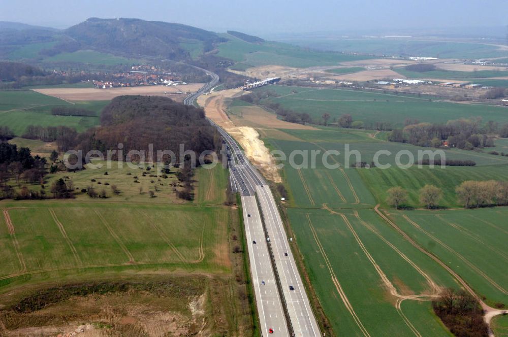 Sättelstädt from the bird's eye view: Blick auf die Baustelle des Übergang der alten A4 auf die neue A4 bei Sättelstädt. Der Neubau ist Teil des Projekt Nordverlegung / Umfahrung Hörselberge der Autobahn E40 / A4 in Thüringen bei Eisenach. Durchgeführt werden die im Zuge dieses Projektes notwendigen Arbeiten unter an derem von den Mitarbeitern der Niederlassung Weimar der EUROVIA Verkehrsbau Union sowie der Niederlassungen Abbruch und Erdbau, Betonstraßenbau, Ingenieurbau und TECO Schallschutz der EUROVIA Beton sowie der DEGES.