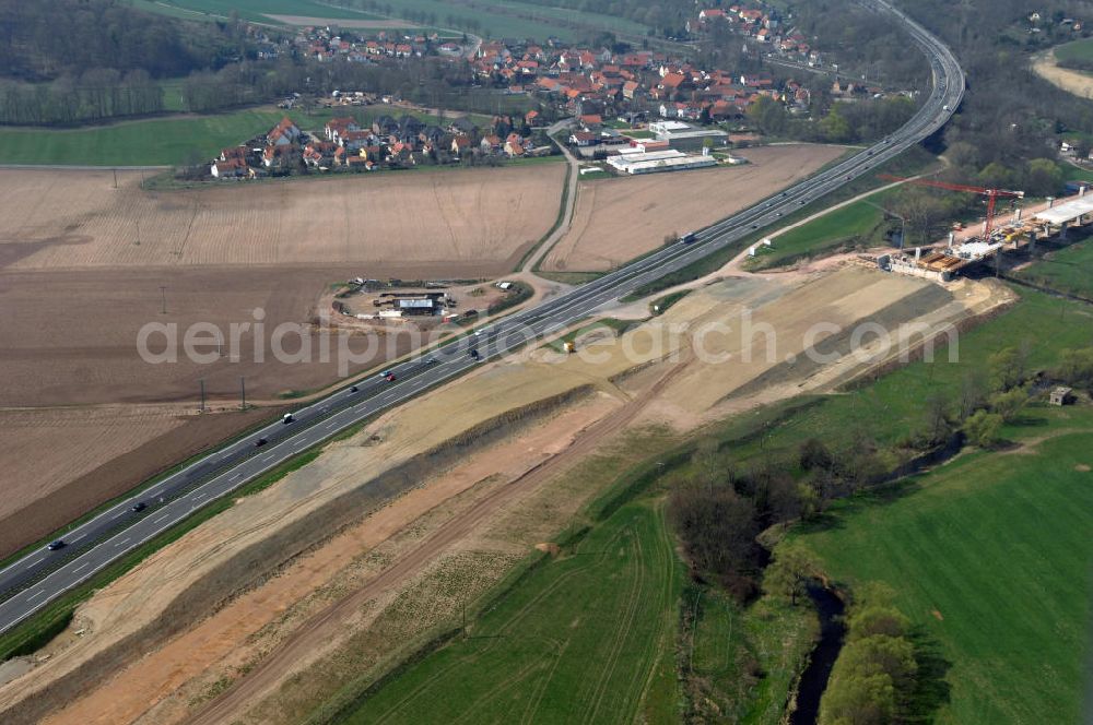 Aerial image Sättelstädt - Blick auf die Baustelle des Übergang der alten A4 auf die neue A4 bei Sättelstädt. Der Neubau ist Teil des Projekt Nordverlegung / Umfahrung Hörselberge der Autobahn E40 / A4 in Thüringen bei Eisenach. Durchgeführt werden die im Zuge dieses Projektes notwendigen Arbeiten unter an derem von den Mitarbeitern der Niederlassung Weimar der EUROVIA Verkehrsbau Union sowie der Niederlassungen Abbruch und Erdbau, Betonstraßenbau, Ingenieurbau und TECO Schallschutz der EUROVIA Beton sowie der DEGES.