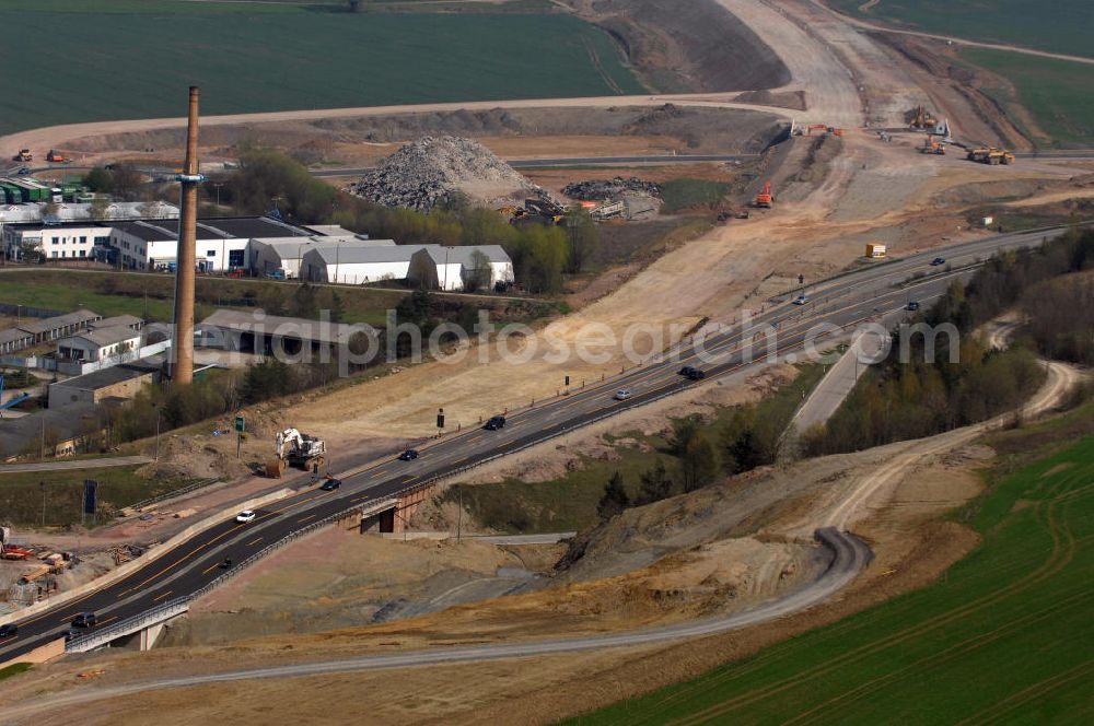 Aerial image Eisenach - Blick auf die Baustelle des Übergang der alten A4 auf die neue A4 nahe der neuen Anschlussstelle Eisenach-West. Der Neubau ist Teil des Projekt Nordverlegung / Umfahrung Hörselberge der Autobahn E40 / A4 in Thüringen bei Eisenach. Durchgeführt werden die im Zuge dieses Projektes notwendigen Arbeiten unter an derem von den Mitarbeitern der Niederlassung Weimar der EUROVIA Verkehrsbau Union sowie der Niederlassungen Abbruch und Erdbau, Betonstraßenbau, Ingenieurbau und TECO Schallschutz der EUROVIA Beton sowie der DEGES.