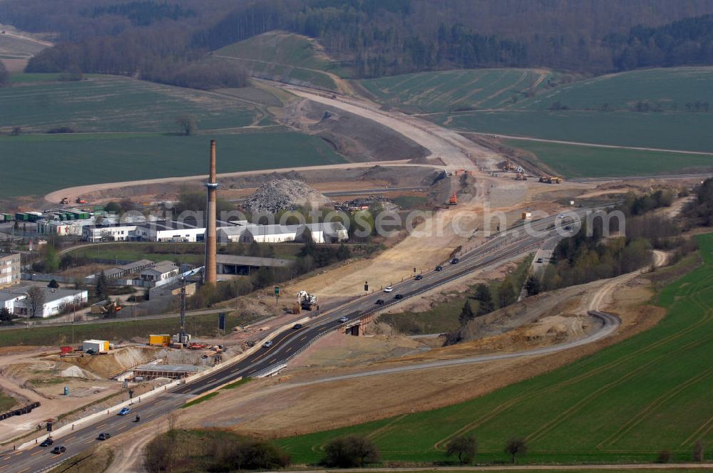 Aerial photograph Eisenach - Blick auf die Baustelle des Übergang der alten A4 auf die neue A4 nahe der neuen Anschlussstelle Eisenach-West. Der Neubau ist Teil des Projekt Nordverlegung / Umfahrung Hörselberge der Autobahn E40 / A4 in Thüringen bei Eisenach. Durchgeführt werden die im Zuge dieses Projektes notwendigen Arbeiten unter an derem von den Mitarbeitern der Niederlassung Weimar der EUROVIA Verkehrsbau Union sowie der Niederlassungen Abbruch und Erdbau, Betonstraßenbau, Ingenieurbau und TECO Schallschutz der EUROVIA Beton sowie der DEGES.