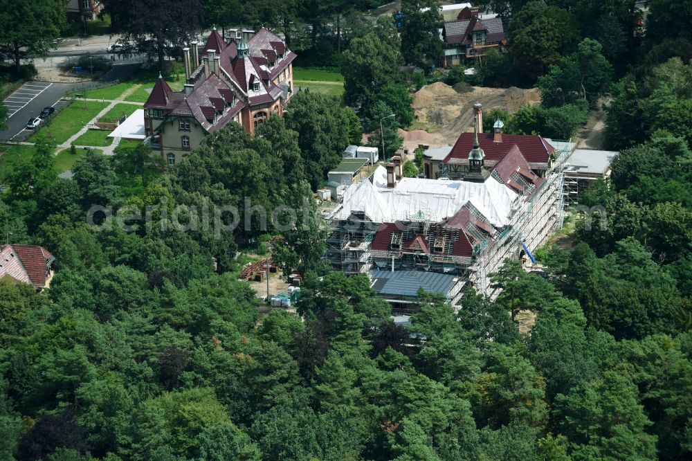 Beelitz from the bird's eye view: Construction site of the new buildings of the retirement home - retirement on Gelaende of Sanatorium Beelitz-Heilstaetten Strasse nach Fichtenwalde in Beelitz in the state Brandenburg, Germany