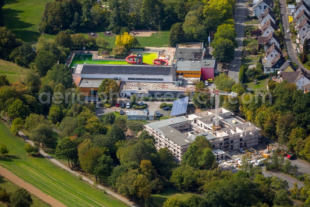 Netphen from the bird's eye view: Construction site of the new buildings of the retirement home - retirement Haus St. Anna on Brauersdorfer Strasse in Netphen in the state North Rhine-Westphalia, Germany