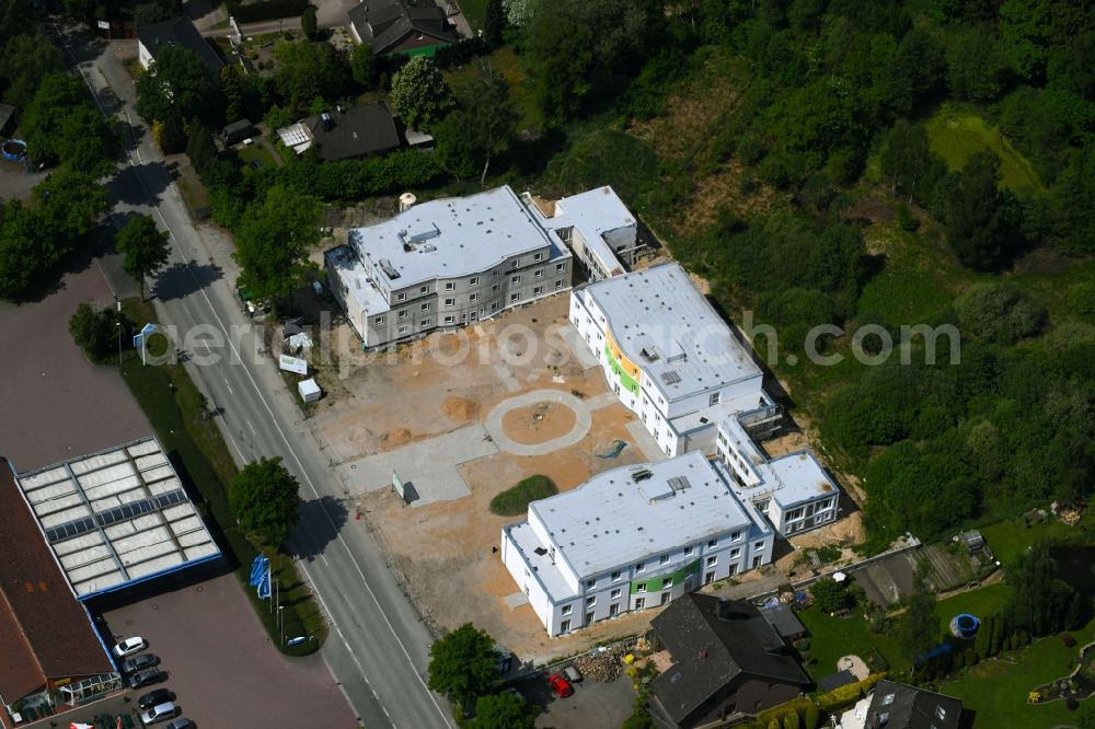 Aerial image Bark - Construction site of the new buildings of the retirement home - retirement Seniorenlandhaus on Segeberger Forst on Bockhorner Landstrasse in Bark in the state Schleswig-Holstein, Germany