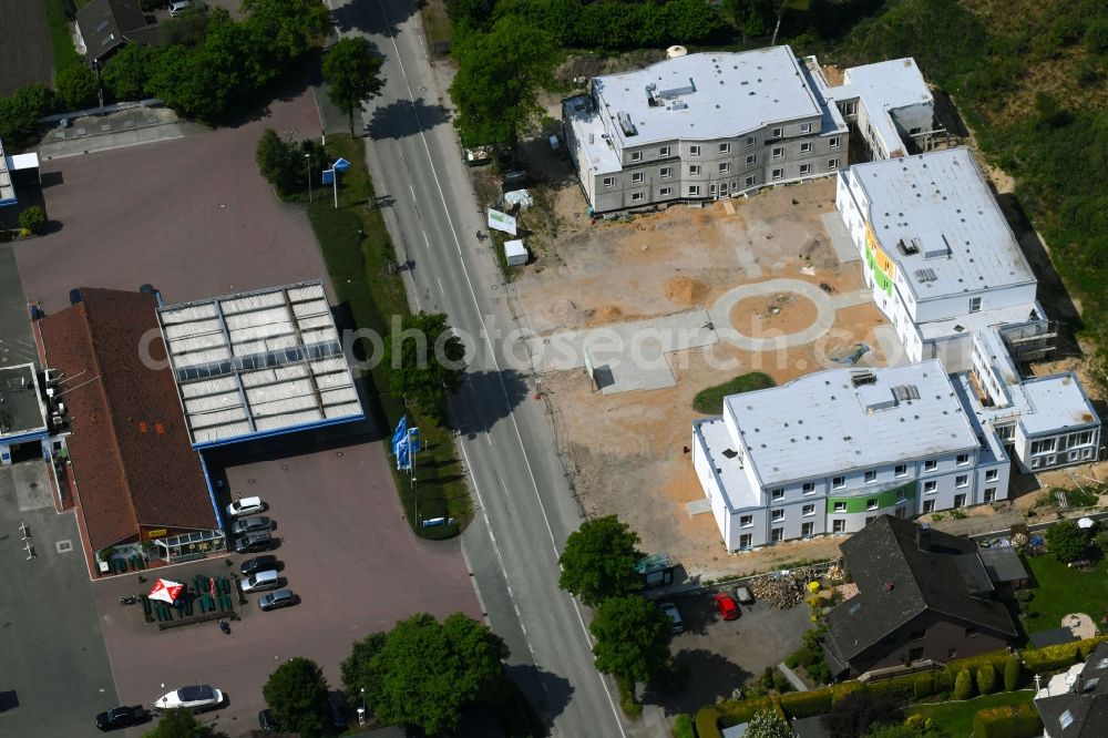 Aerial photograph Bark - Construction site of the new buildings of the retirement home - retirement Seniorenlandhaus on Segeberger Forst on Bockhorner Landstrasse in Bark in the state Schleswig-Holstein, Germany