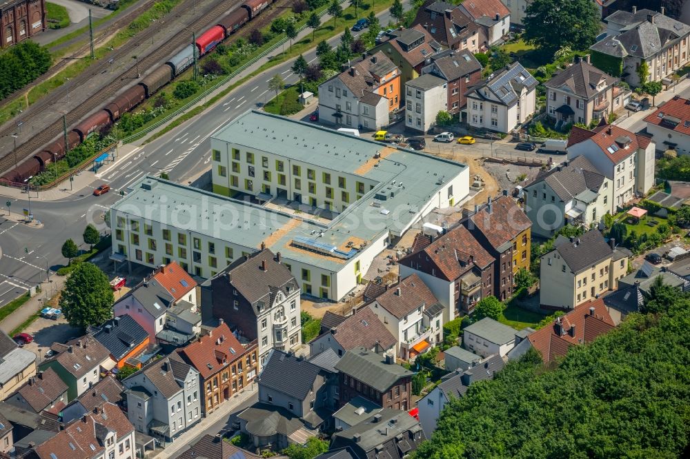 Hohenlimburg from above - Construction site of the new buildings of the retirement home - retirement a??Wohlbehagen unter dem Schlossberga?? of FFB-Projektentwicklung GmbH und Beteiligung der Ambrock GmbH in Hohenlimburg in the state North Rhine-Westphalia