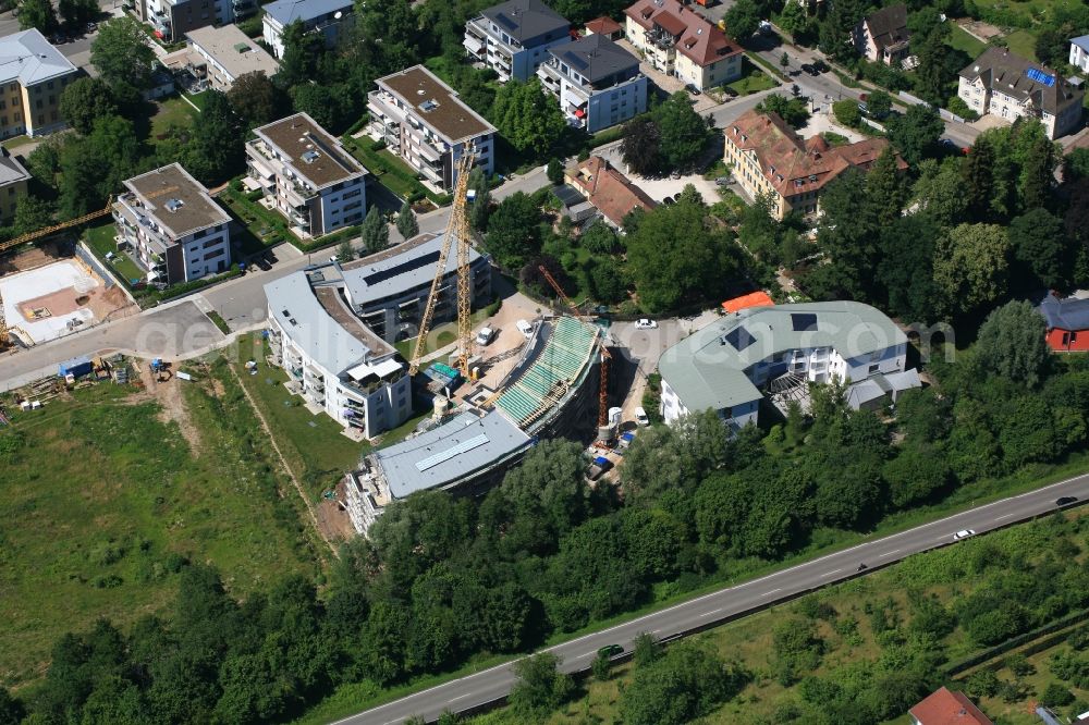 Schopfheim from the bird's eye view: Construction site of the new buildings Wohnen am Eisweiher next to the retirement home - retirement House Columban in Schopfheim in the state Baden-Wurttemberg, Germany