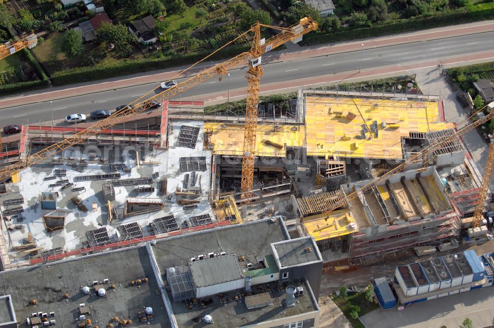 Aerial photograph Magdeburg - Blick auf die Baustelle vom Neubau am Leibniz-Institut für Neurobiologie im Stadtteil Alte-Neustadt. Nach der Fertigstellung des Neubaus erfolgt der Abriss des Bestandsgebäudes. Kontakt: Leibniz-Institut für Neurobiologie (IfN) Stiftung des Öffentlichen Rechts, Brenneckestraße 6, 39118 Magdeburg, Tel. +49(0)391 6263219, Fax +49(0)391 616160, email: WO@ifn-magdeburg.de; Planungsgemainschaft: pbr Planungsbüro Rohling AG und Assmann Beraten + Planen GmbH, Ansprechpartner: Herr Jörg Rasehorn, rasehorn.joerg@pbr.de