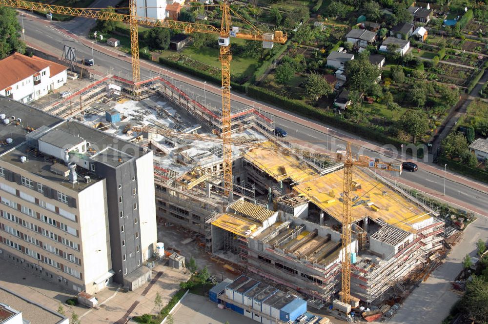 Aerial image Magdeburg - Blick auf die Baustelle vom Neubau am Leibniz-Institut für Neurobiologie im Stadtteil Alte-Neustadt. Nach der Fertigstellung des Neubaus erfolgt der Abriss des Bestandsgebäudes. Kontakt: Leibniz-Institut für Neurobiologie (IfN) Stiftung des Öffentlichen Rechts, Brenneckestraße 6, 39118 Magdeburg, Tel. +49(0)391 6263219, Fax +49(0)391 616160, email: WO@ifn-magdeburg.de; Planungsgemainschaft: pbr Planungsbüro Rohling AG und Assmann Beraten + Planen GmbH, Ansprechpartner: Herr Jörg Rasehorn, rasehorn.joerg@pbr.de