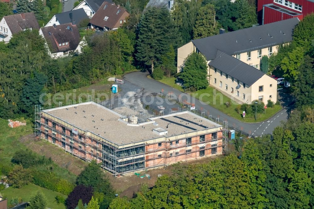 Aerial image Arnsberg - Construction site of a new build retirement home of Deutscher Caritasverband e. V. in Arnsberg in the state North Rhine-Westphalia, Germany