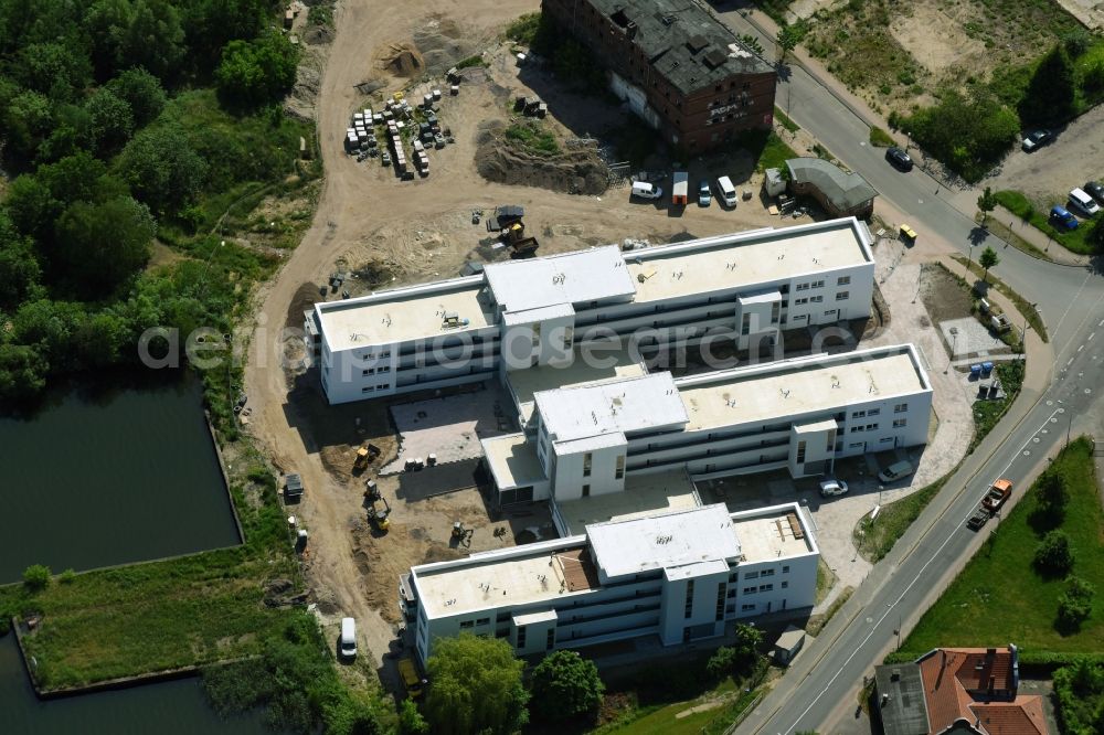 Aerial photograph Neuruppin - Construction site of a new build retirement home Seetor Residenz between Seedamm and An der Seepromenade in Neuruppin in the state Brandenburg, Germany