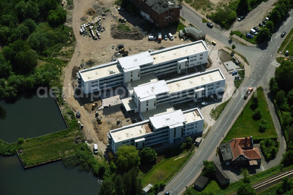 Neuruppin from above - Construction site of a new build retirement home Seetor Residenz between Seedamm and An der Seepromenade in Neuruppin in the state Brandenburg, Germany