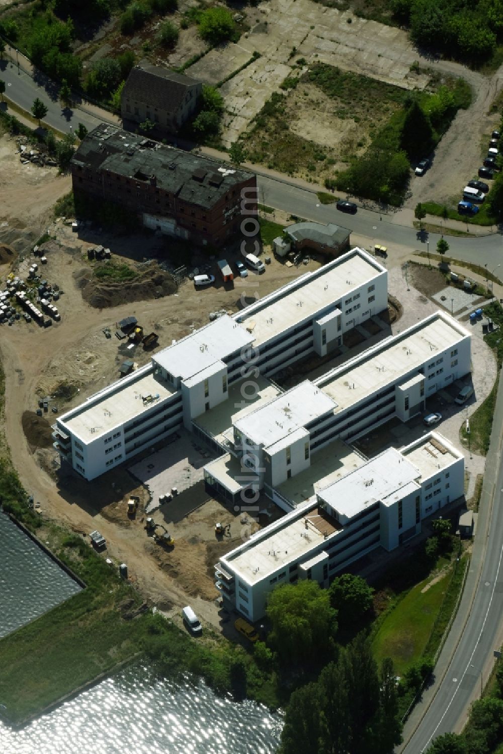 Aerial photograph Neuruppin - Construction site of a new build retirement home Seetor Residenz between Seedamm and An der Seepromenade in Neuruppin in the state Brandenburg, Germany