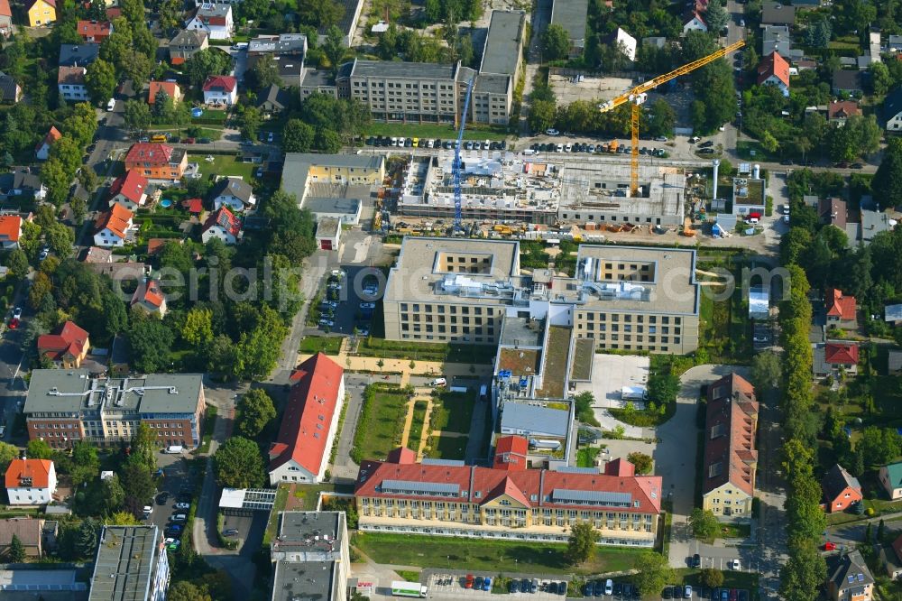 Berlin from the bird's eye view: Construction site of a new build retirement home of Vivantes Forum fuer Senioren GmbH on Muensterberger Weg in the district Kaulsdorf in Berlin, Germany