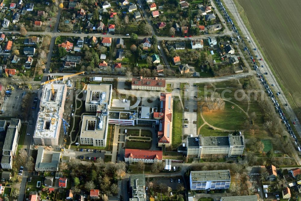 Berlin from above - Construction site of a new build retirement home of Vivantes Forum fuer Senioren GmbH on Muensterberger Weg in the district Kaulsdorf in Berlin, Germany