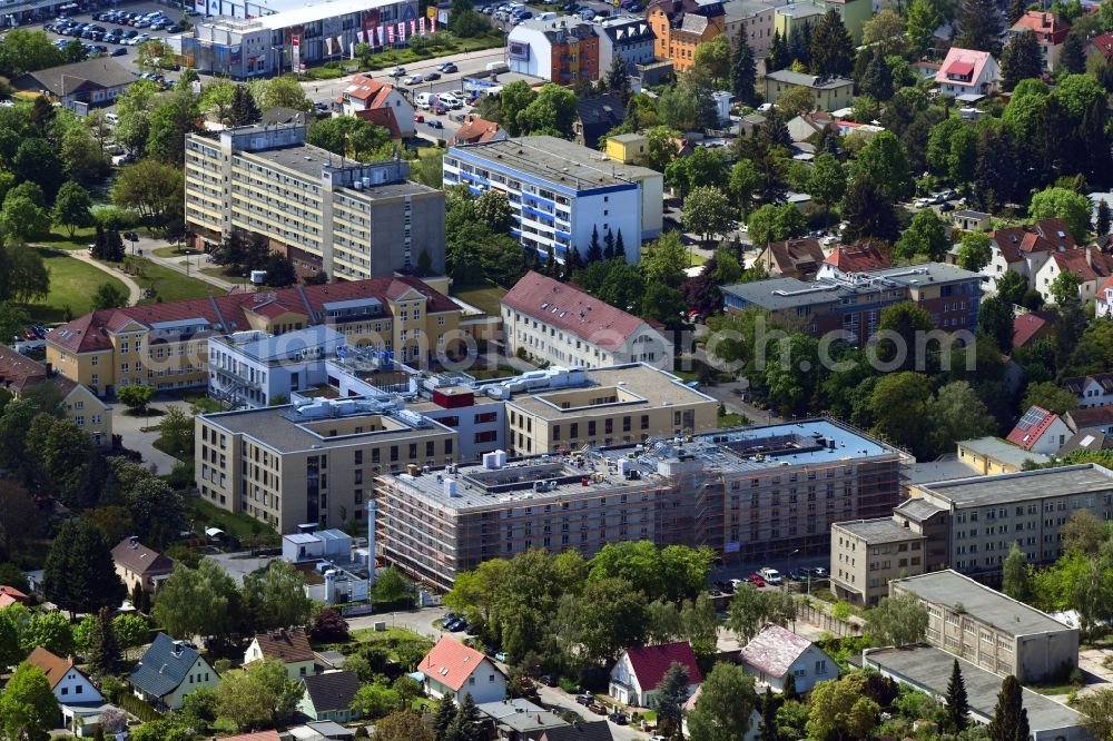 Berlin from above - Construction site of a new build retirement home of Vivantes Forum fuer Senioren GmbH on Muensterberger Weg in the district Kaulsdorf in Berlin, Germany