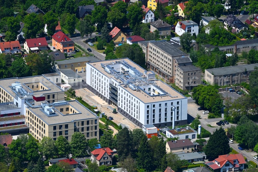 Berlin from above - Construction site of a new build retirement home of Vivantes Forum fuer Senioren GmbH on Muensterberger Weg in the district Kaulsdorf in Berlin, Germany