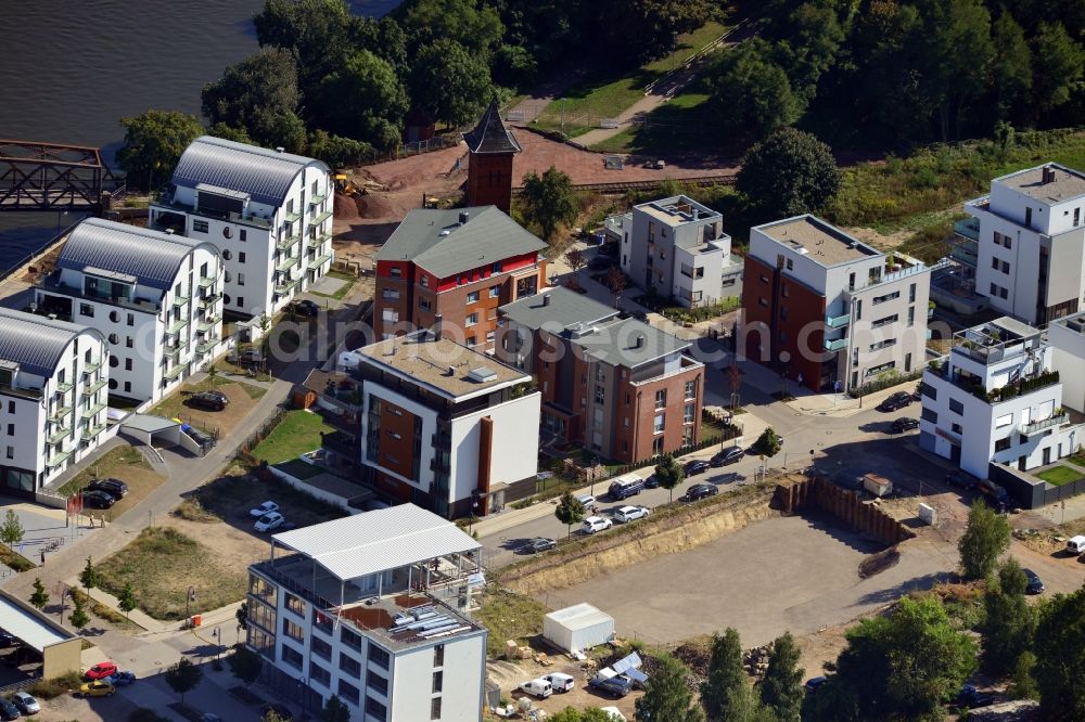 Magdeburg from above - Construction site of a new building - complex with multi-family homes in the development area Elbbahnhof in Magdeburg in Saxony-Anhalt