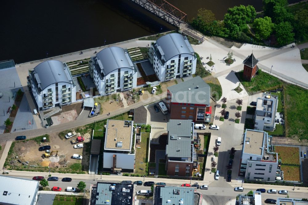 Magdeburg from the bird's eye view: Construction site of a new building - complex with multi-family homes in the development area Elbbahnhof in Magdeburg in Saxony-Anhalt