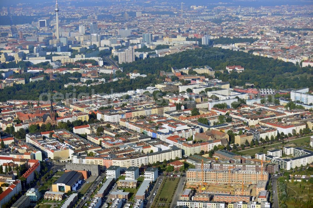 Aerial image Berlin - View at the construction site of a new building and urban house settlement on the site of the former old slaughterhouse in the Thaerstraße in the district Friedrichshain in Berlin. The project was developed by the AVILA Management & Consulting AG in the context of creating a new city quarter. Operating construction company is the MBU Märkische Bau-Union GmbH + Co KG