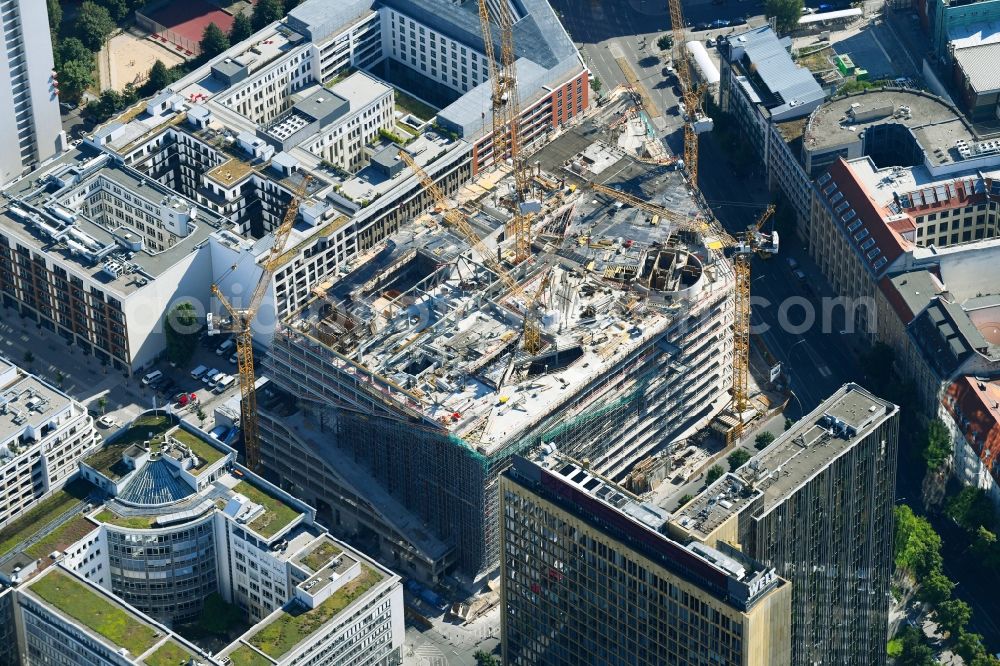 Aerial image Berlin - Construction site with pile foundation work for the foundation plate of the new building Axel Springer Campus - OMA to Krausenstrasse - Schuetzenstrasse in Berlin