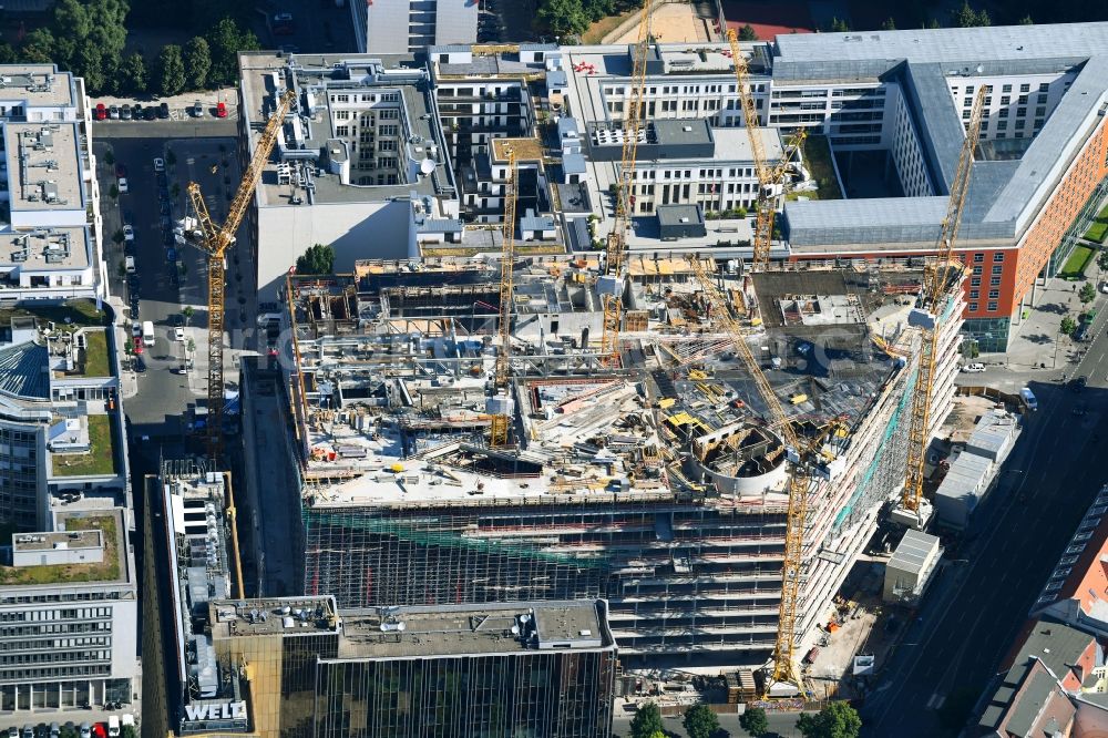 Aerial photograph Berlin - Construction site with pile foundation work for the foundation plate of the new building Axel Springer Campus - OMA to Krausenstrasse - Schuetzenstrasse in Berlin