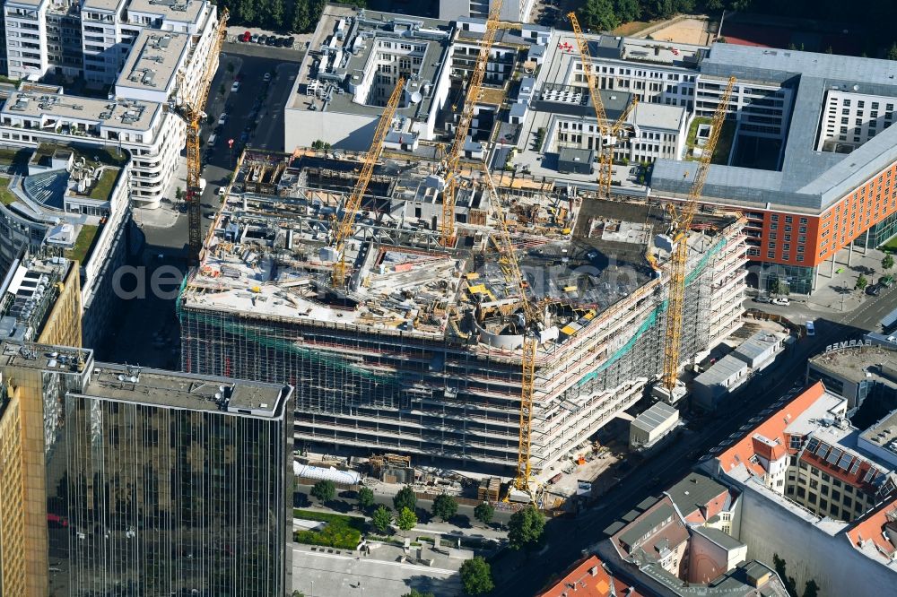 Berlin from above - Construction site with pile foundation work for the foundation plate of the new building Axel Springer Campus - OMA to Krausenstrasse - Schuetzenstrasse in Berlin