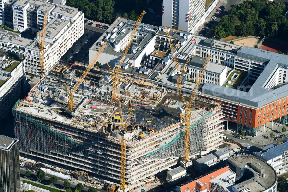 Berlin from the bird's eye view: Construction site with pile foundation work for the foundation plate of the new building Axel Springer Campus - OMA to Krausenstrasse - Schuetzenstrasse in Berlin