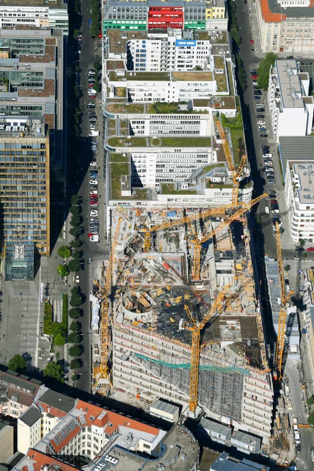 Berlin from above - Construction site with pile foundation work for the foundation plate of the new building Axel Springer Campus - OMA to Krausenstrasse - Schuetzenstrasse in Berlin