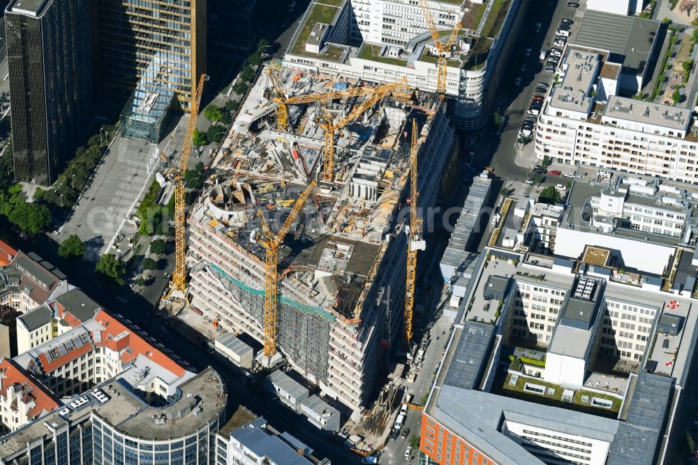 Berlin from the bird's eye view: Construction site with pile foundation work for the foundation plate of the new building Axel Springer Campus - OMA to Krausenstrasse - Schuetzenstrasse in Berlin