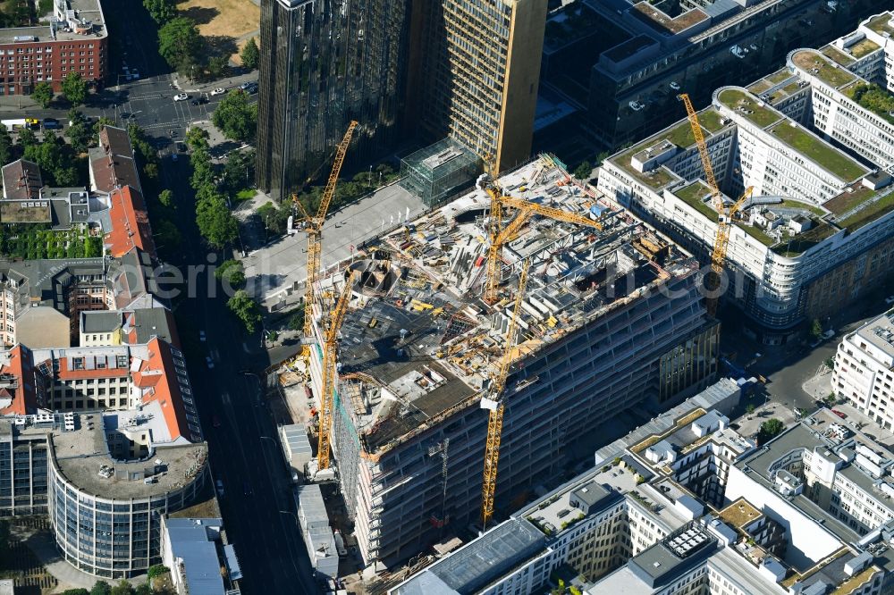 Aerial image Berlin - Construction site with pile foundation work for the foundation plate of the new building Axel Springer Campus - OMA to Krausenstrasse - Schuetzenstrasse in Berlin