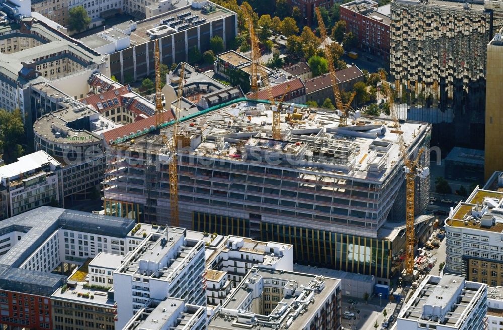 Berlin from above - Construction site with pile foundation work for the foundation plate of the new building Axel Springer Campus - OMA to Krausenstrasse - Schuetzenstrasse in Berlin