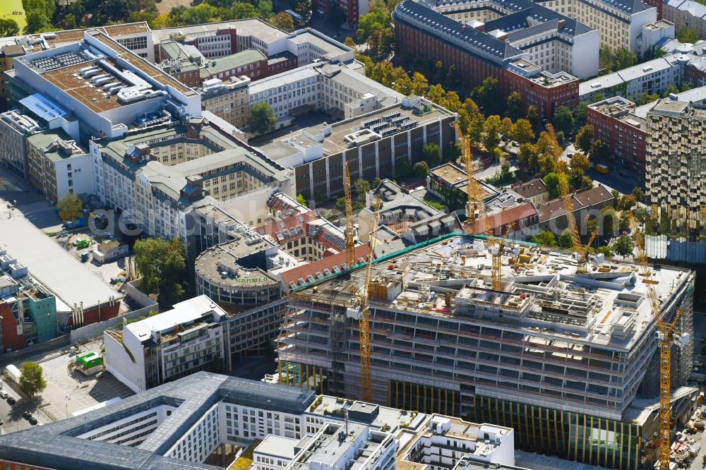 Aerial image Berlin - Construction site with pile foundation work for the foundation plate of the new building Axel Springer Campus - OMA to Krausenstrasse - Schuetzenstrasse in Berlin