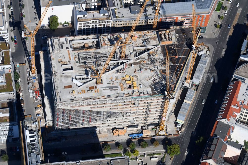 Aerial photograph Berlin - Construction site with pile foundation work for the foundation plate of the new building Axel Springer Campus - OMA to Krausenstrasse - Schuetzenstrasse in Berlin