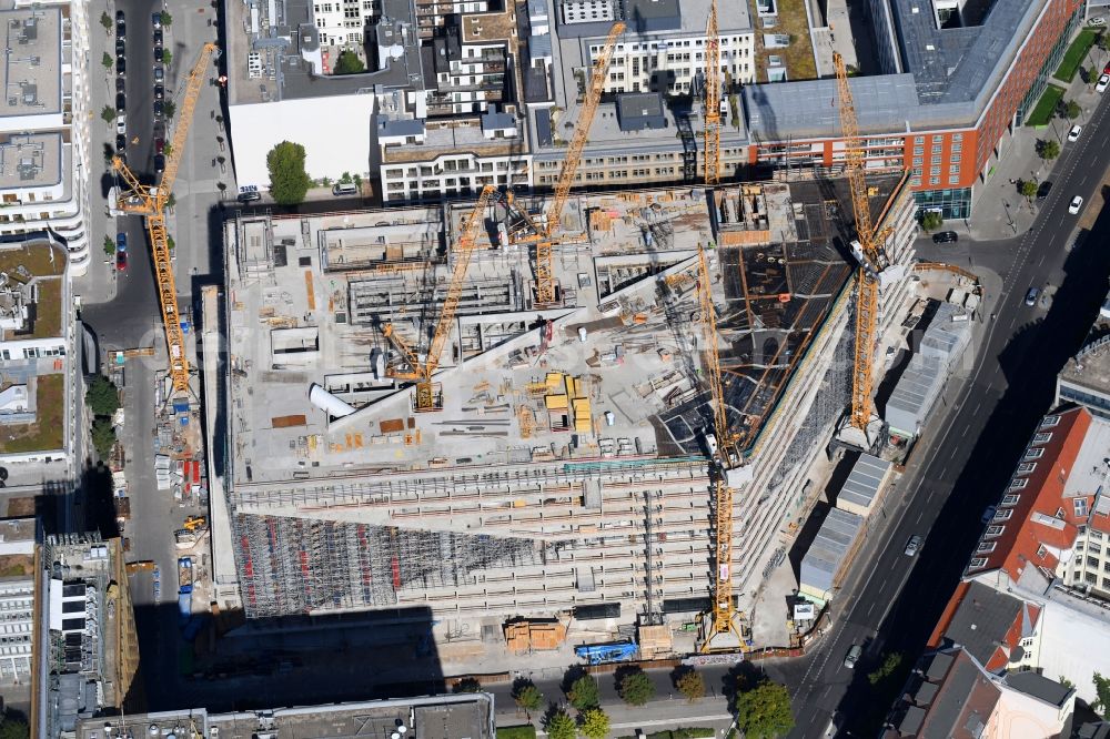 Berlin from above - Construction site with pile foundation work for the foundation plate of the new building Axel Springer Campus - OMA to Krausenstrasse - Schuetzenstrasse in Berlin