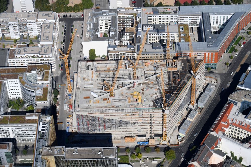 Berlin from the bird's eye view: Construction site with pile foundation work for the foundation plate of the new building Axel Springer Campus - OMA to Krausenstrasse - Schuetzenstrasse in Berlin