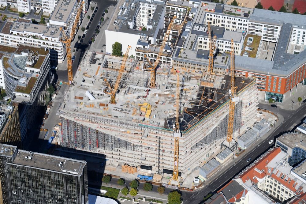 Aerial image Berlin - Construction site with pile foundation work for the foundation plate of the new building Axel Springer Campus - OMA to Krausenstrasse - Schuetzenstrasse in Berlin