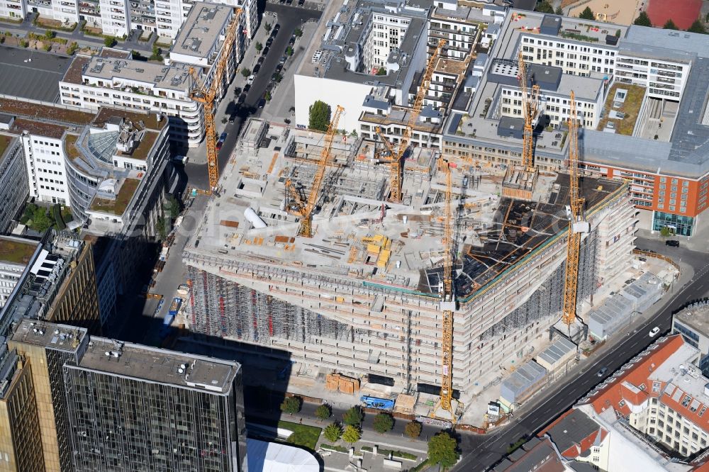 Aerial photograph Berlin - Construction site with pile foundation work for the foundation plate of the new building Axel Springer Campus - OMA to Krausenstrasse - Schuetzenstrasse in Berlin