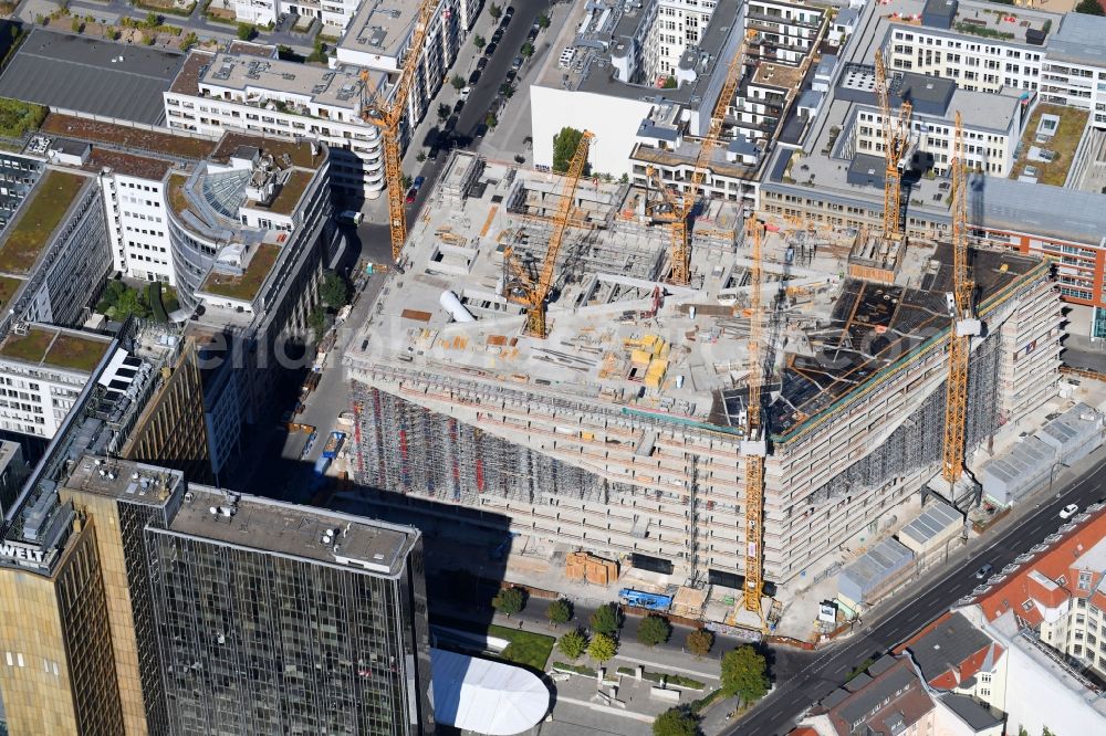 Berlin from above - Construction site with pile foundation work for the foundation plate of the new building Axel Springer Campus - OMA to Krausenstrasse - Schuetzenstrasse in Berlin