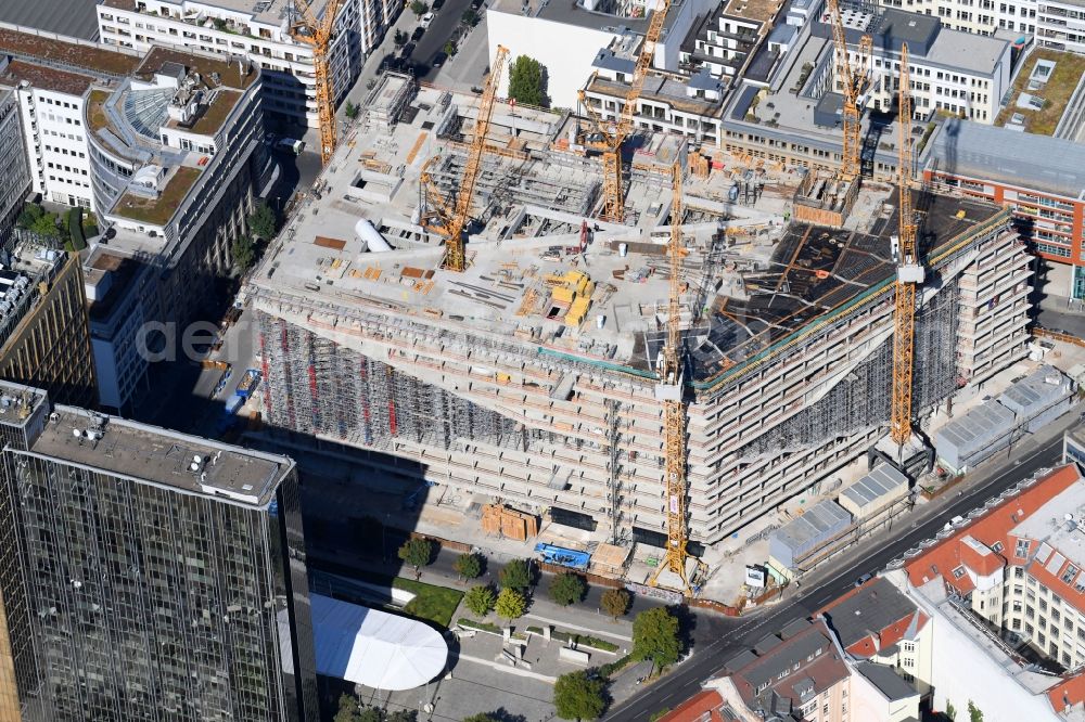 Berlin from the bird's eye view: Construction site with pile foundation work for the foundation plate of the new building Axel Springer Campus - OMA to Krausenstrasse - Schuetzenstrasse in Berlin