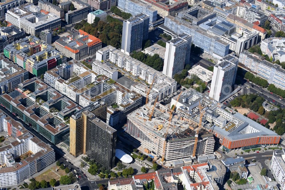 Berlin from above - Construction site with pile foundation work for the foundation plate of the new building Axel Springer Campus - OMA to Krausenstrasse - Schuetzenstrasse in Berlin