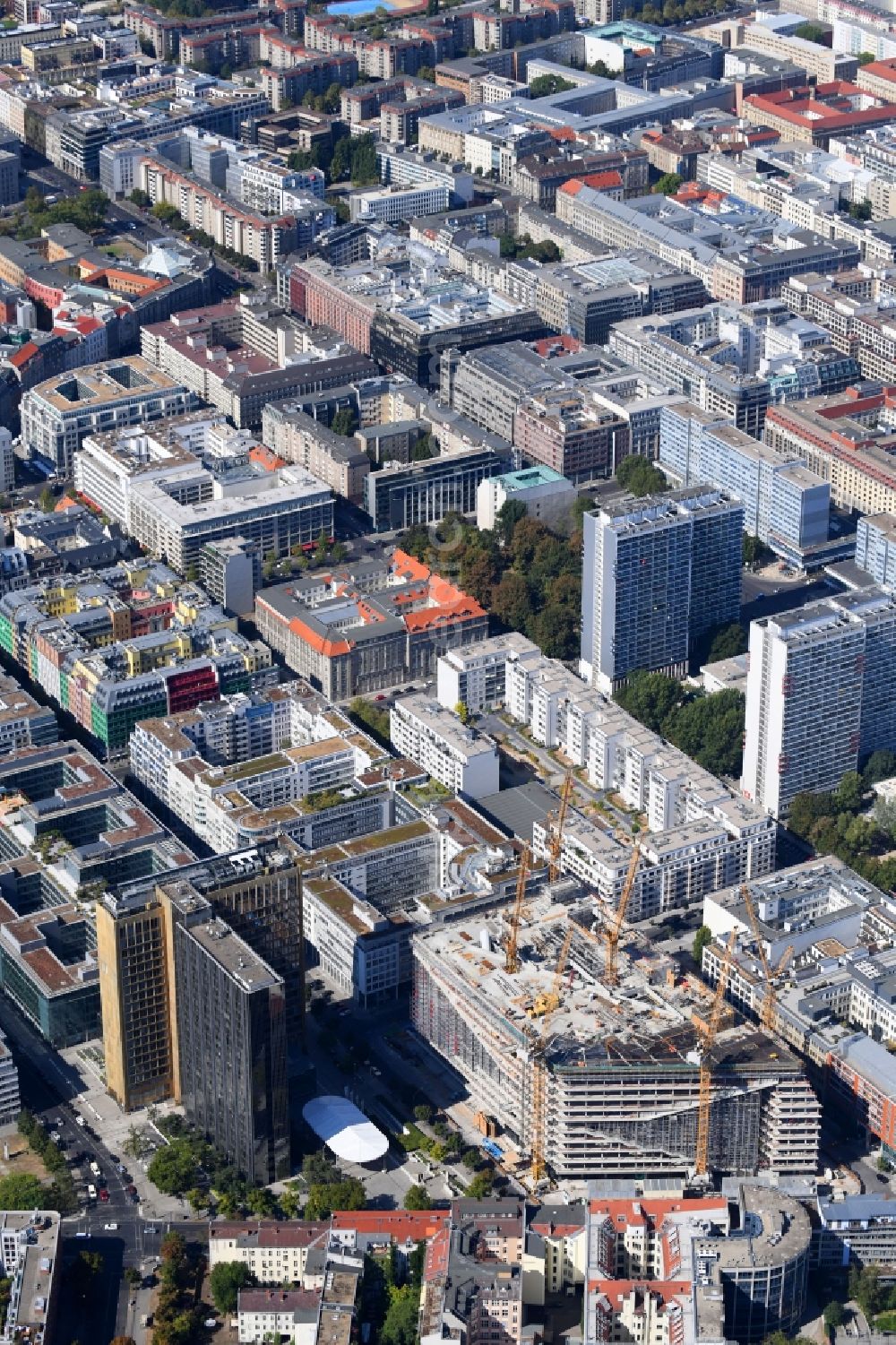 Berlin from above - Construction site with pile foundation work for the foundation plate of the new building Axel Springer Campus - OMA to Krausenstrasse - Schuetzenstrasse in Berlin