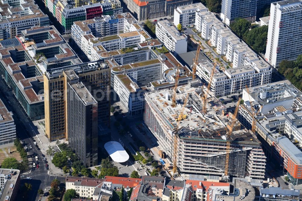 Berlin from the bird's eye view: Construction site with pile foundation work for the foundation plate of the new building Axel Springer Campus - OMA to Krausenstrasse - Schuetzenstrasse in Berlin