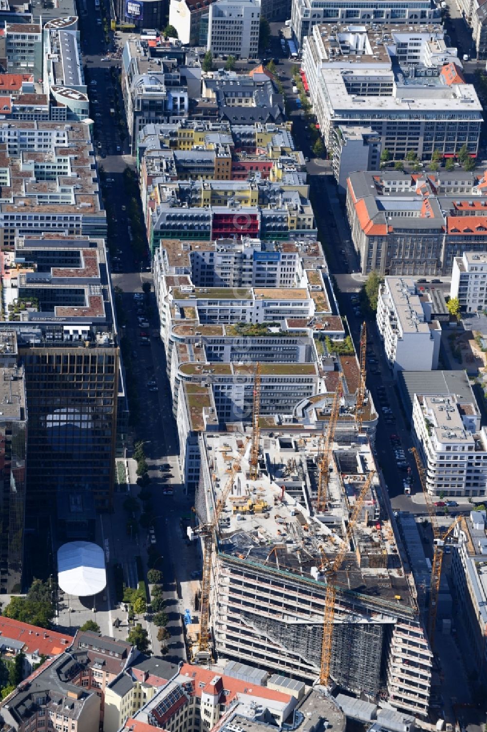 Berlin from above - Construction site with pile foundation work for the foundation plate of the new building Axel Springer Campus - OMA to Krausenstrasse - Schuetzenstrasse in Berlin