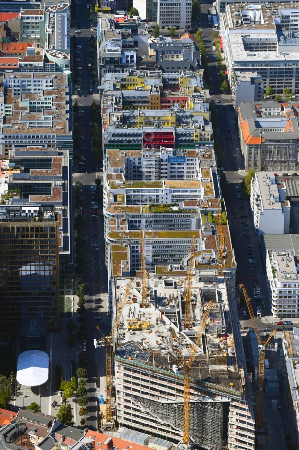 Berlin from the bird's eye view: Construction site with pile foundation work for the foundation plate of the new building Axel Springer Campus - OMA to Krausenstrasse - Schuetzenstrasse in Berlin