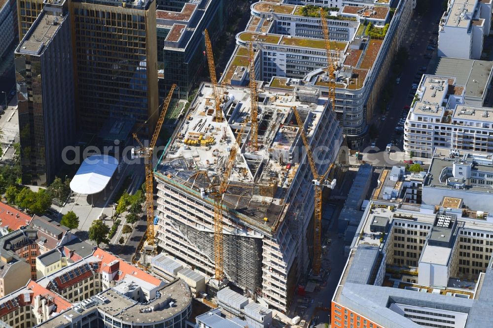 Aerial image Berlin - Construction site with pile foundation work for the foundation plate of the new building Axel Springer Campus - OMA to Krausenstrasse - Schuetzenstrasse in Berlin