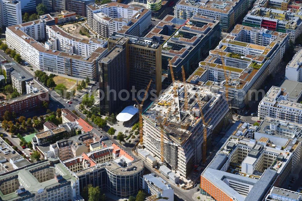 Berlin from above - Construction site with pile foundation work for the foundation plate of the new building Axel Springer Campus - OMA to Krausenstrasse - Schuetzenstrasse in Berlin