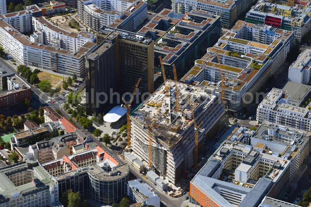 Berlin from the bird's eye view: Construction site with pile foundation work for the foundation plate of the new building Axel Springer Campus - OMA to Krausenstrasse - Schuetzenstrasse in Berlin