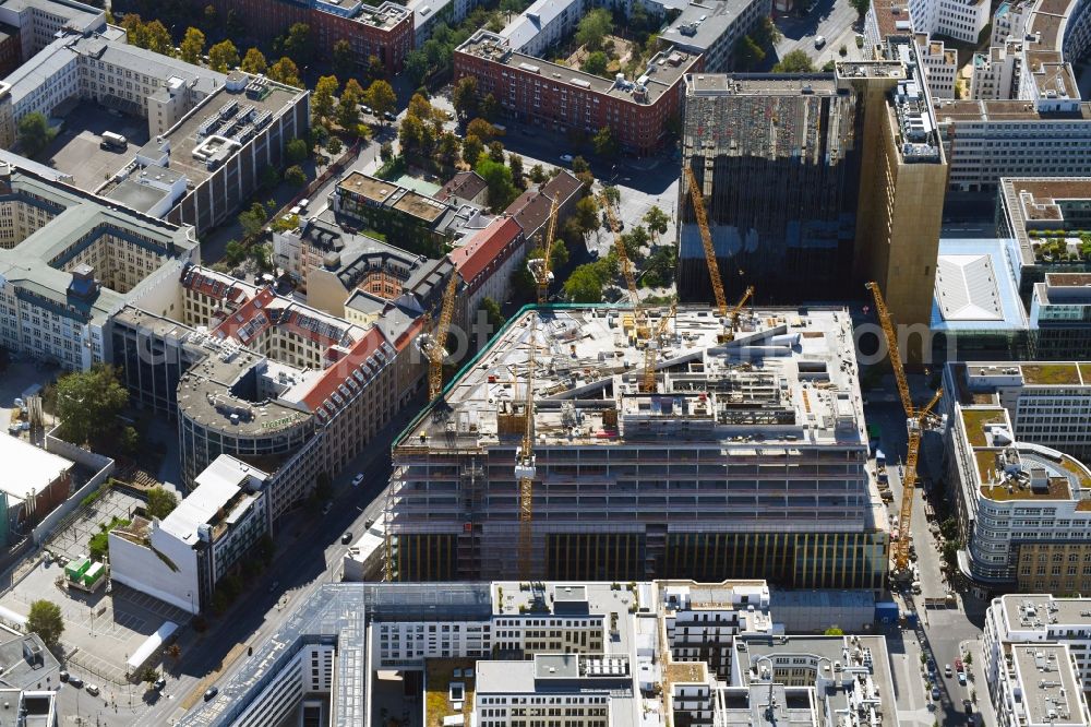 Aerial image Berlin - Construction site with pile foundation work for the foundation plate of the new building Axel Springer Campus - OMA to Krausenstrasse - Schuetzenstrasse in Berlin